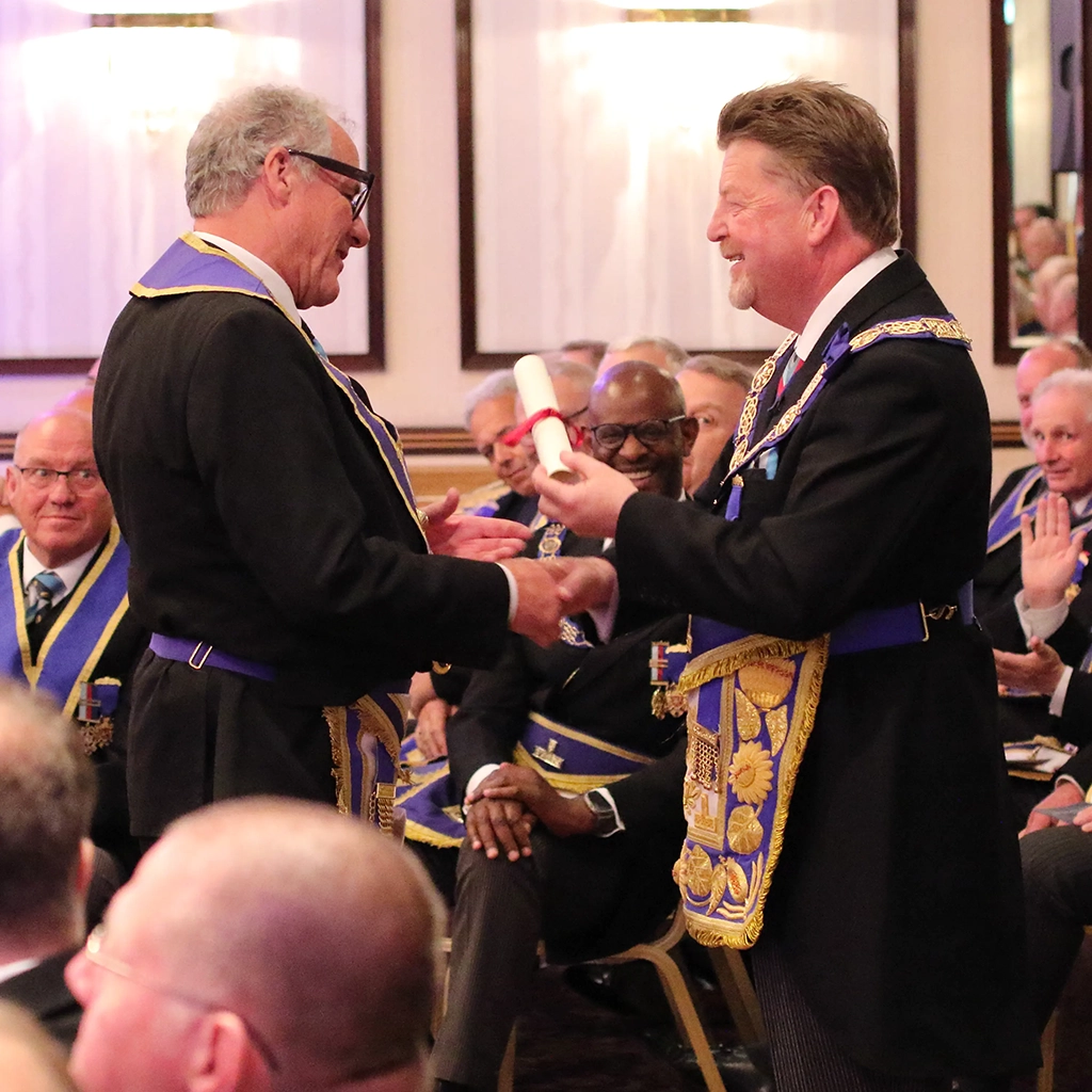 Martin Parrack receives his certificate of merit
