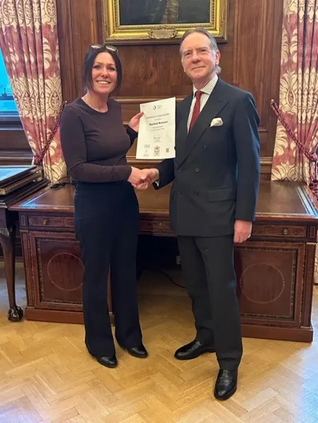Oliver Lodge, Chair of the Masonic Housing Association, presenting the certificate to Rachel Keenan, Scheme Manager (Reading Court).