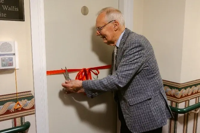 The man himself, with the room in his name, Richard Wallis.