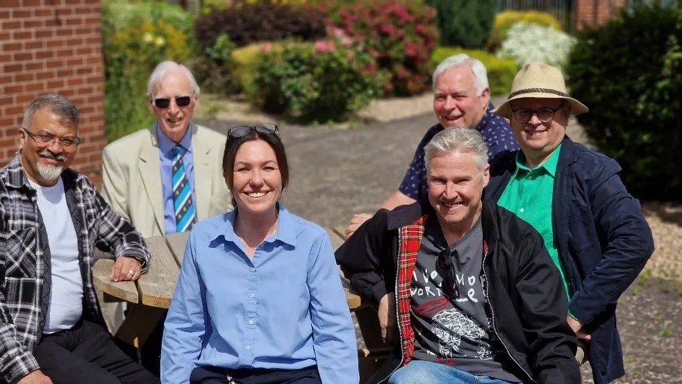 Stoneleigh Lodge donated accessibility picnic table to Reading court: Pictured (clockwise from left): W.M. Prakash Chauhan, John Wolfe, John Kisbey (Chair of the House Committee), Paul Fernandez-Montes, Paul Jackson, and Rachel Keenan (Scheme Manager).