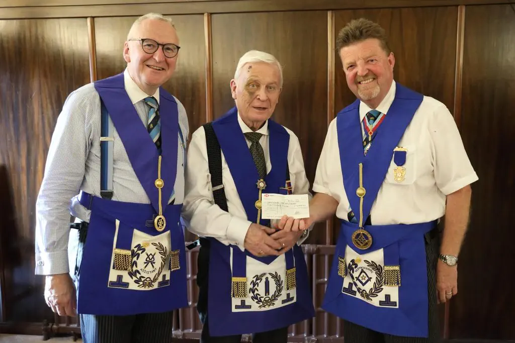 The Head of Freemasonry in Warwickshire, Philip Hall presented his Mark counterpart, Andrew Armbrister, with a cheque for £5,000 towards the 2027 Mark Benevolent Fund Festival.